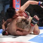 【DEEP130】五明の鋭い打撃を受けながらも、組み続けた椿。バック&左足を制した末にパウンドアウト